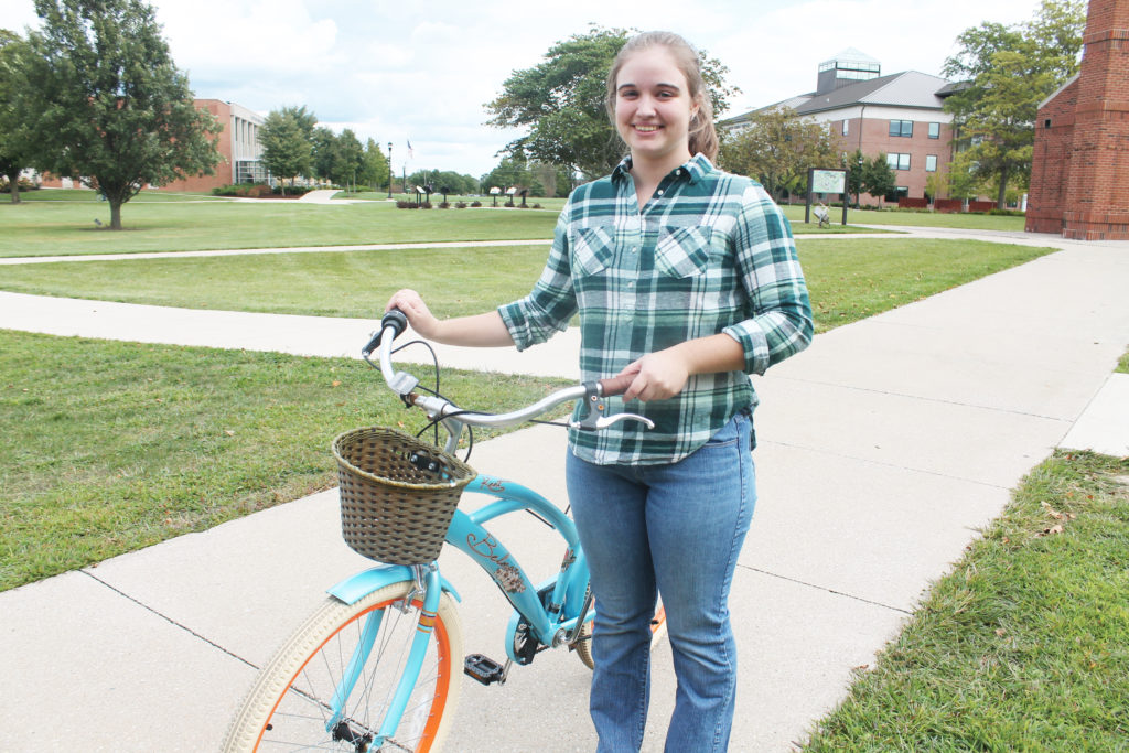 Student with her bicycle